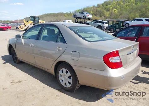 2003 Toyota Camry Le z USA, uszkodzony, nr VIN 4T1BE32K03U760397